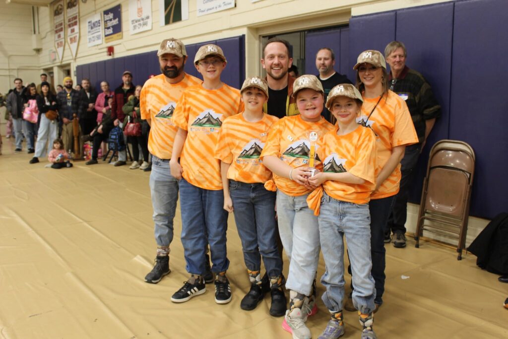 Max Green with students and community members at the 2026 REACT Tournament